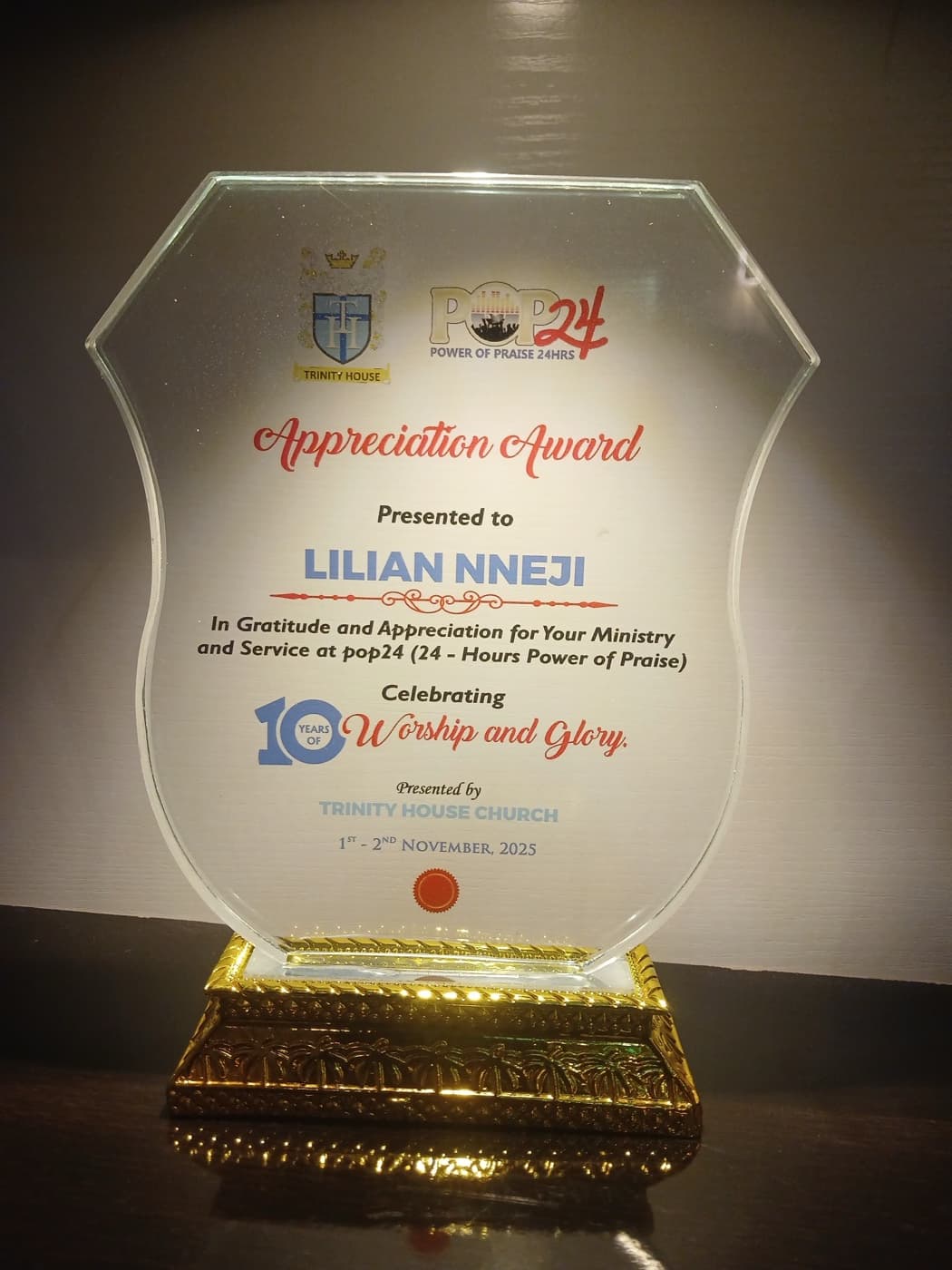 Trinity House Church pop24 Appreciation Award presented to Lilian Nneji