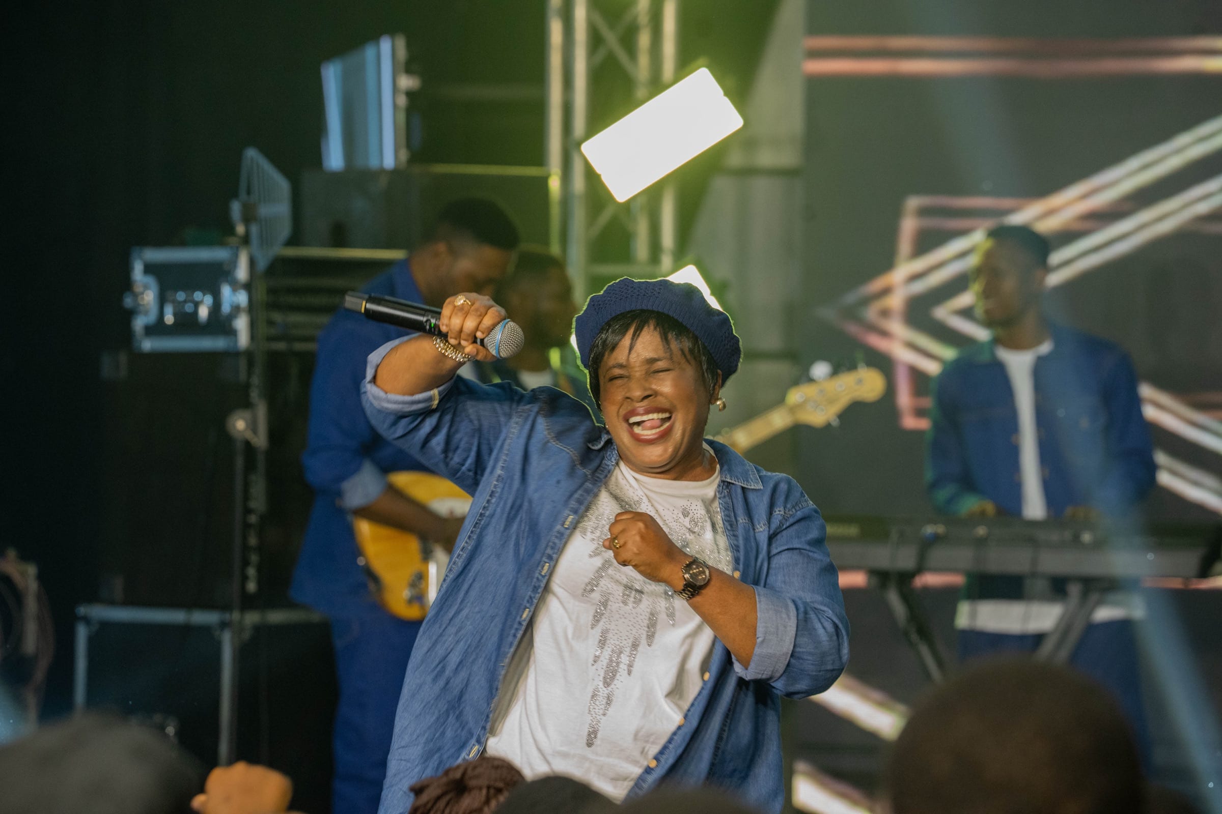 Minister Lilian Nneji in joyful praise with her band